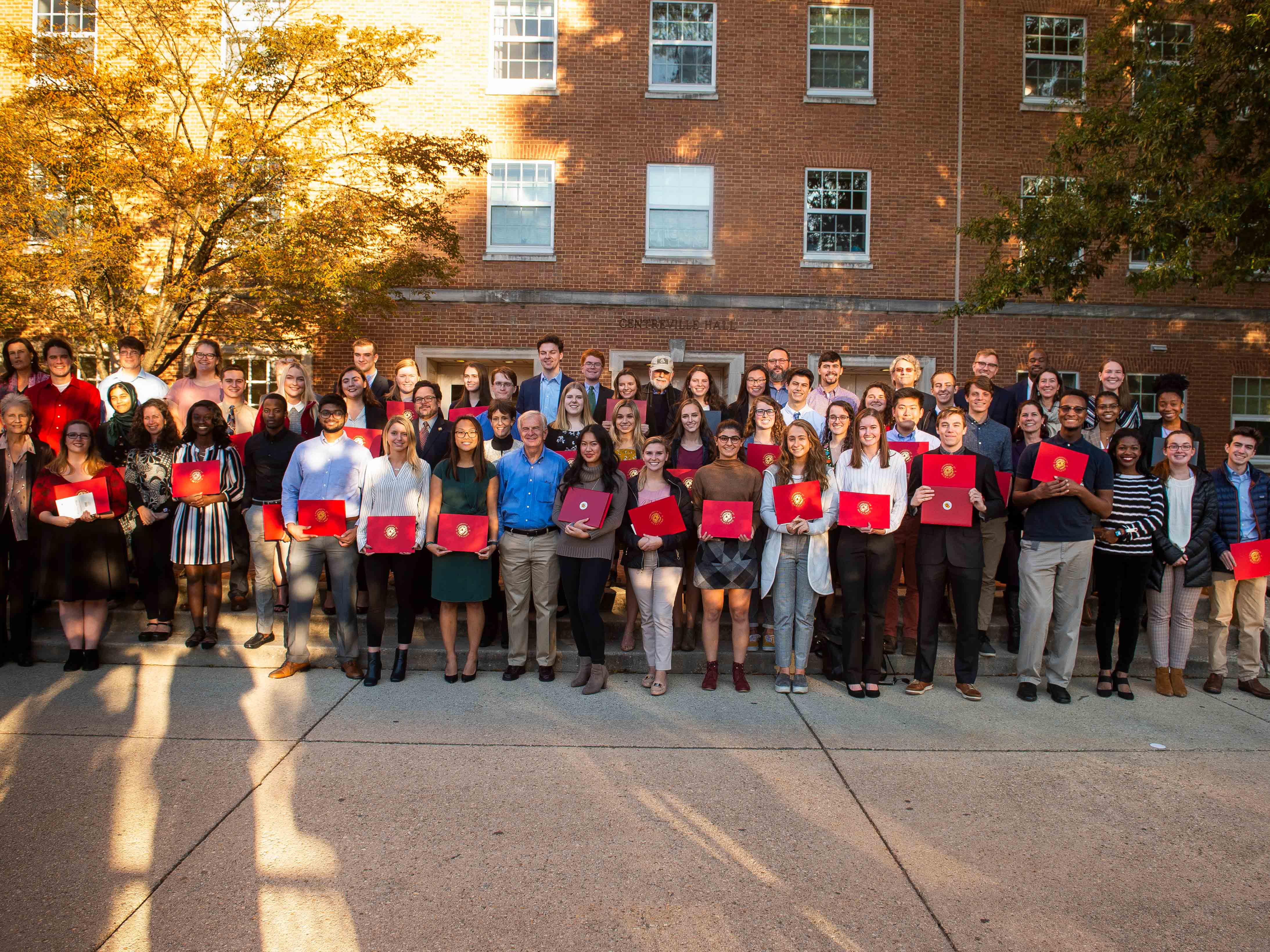 Award recipients line up in front of Centreville Hall