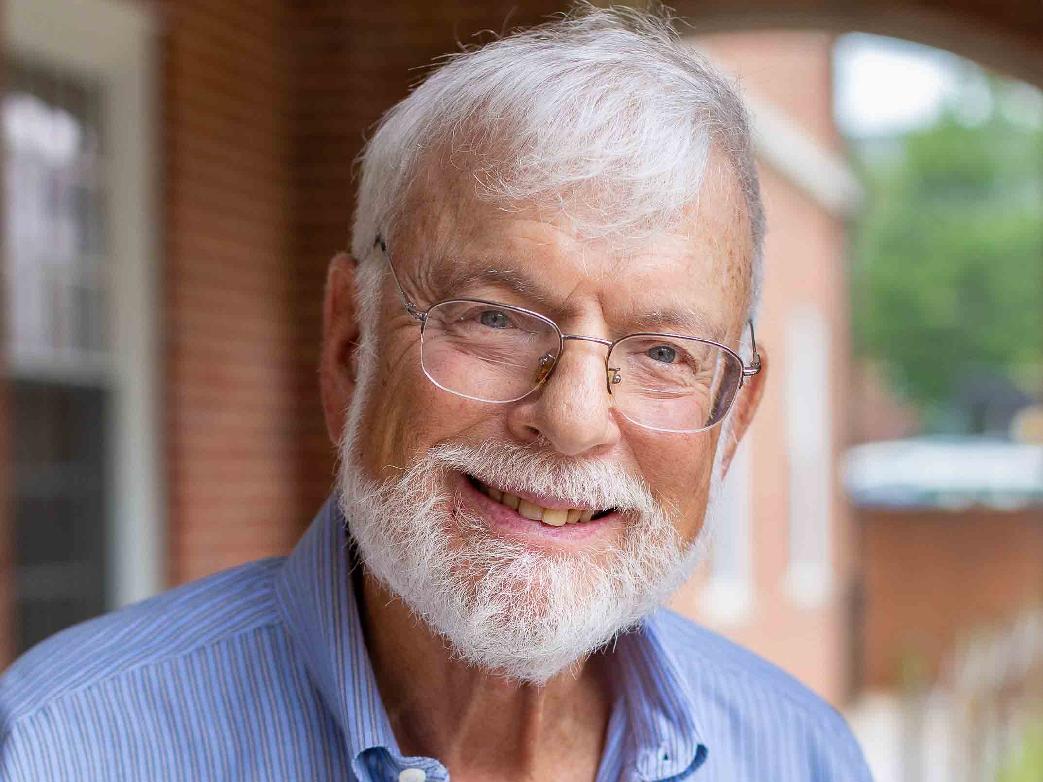 International Studies Director James Glass smiles at camera